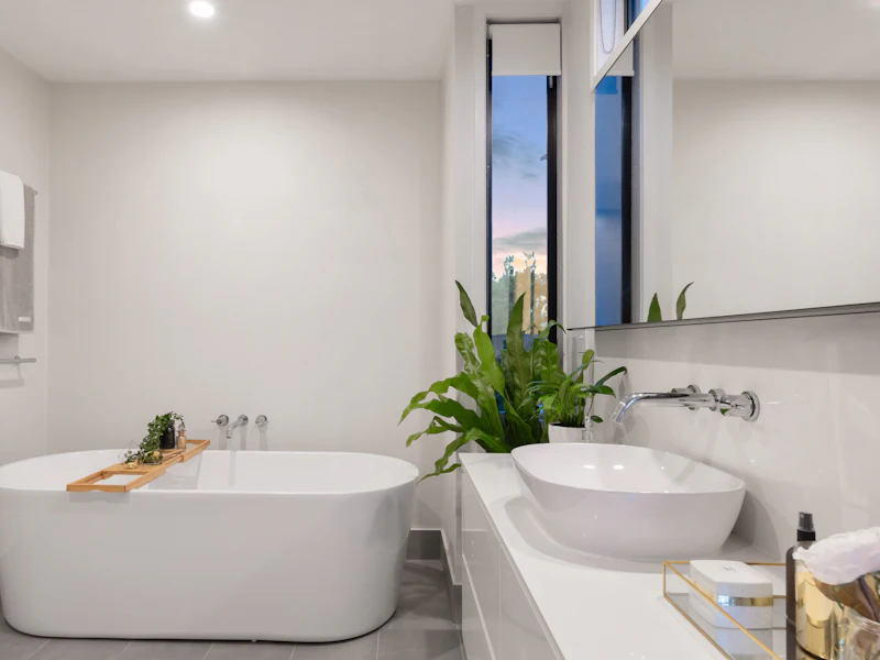 Tiled bathroom with wet-area floor and wall surfaces