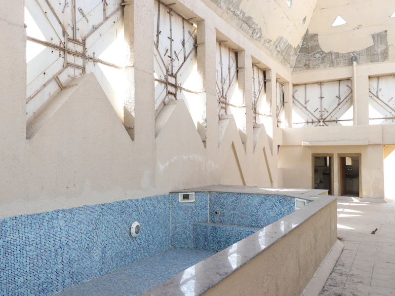 Empty tiled swimming pool structure